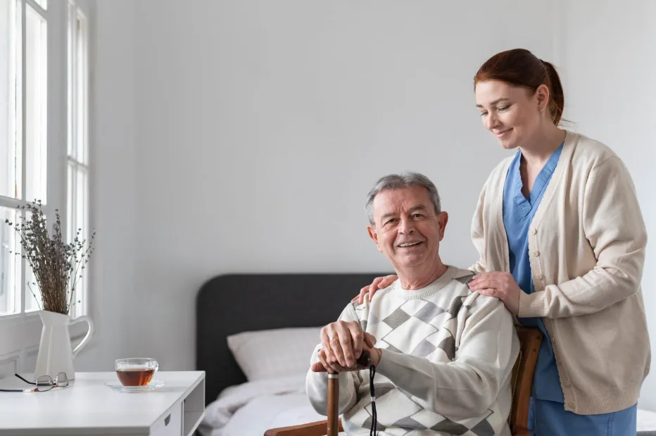 A Sweet Grace social worker sitting with a client